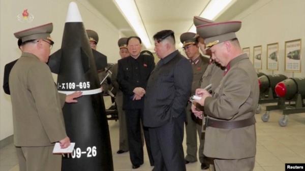 FILE - North Korean leader Kim Jong Un inspects nuclear warheads at an undisclosed location in this image taken from video. (KRT via Reuters)