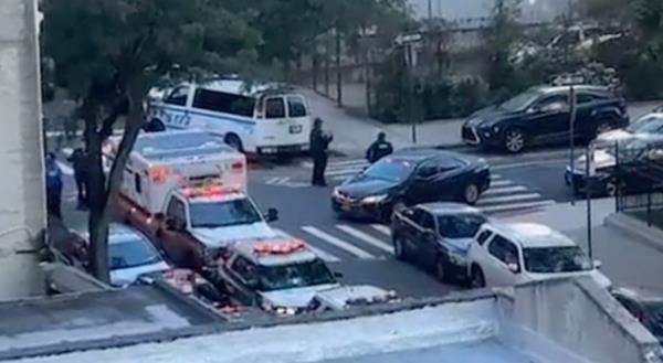 Police at the scene of where two teen boys were slashed outside of Newcomers High School in Queens on October 11, 2023.