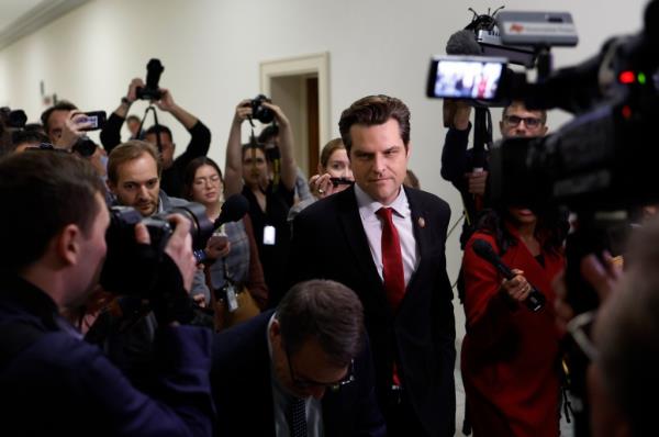 Matt Gaetz talks to reporters as he arrives for a meeting with lawmakers in the Longworth House Office Building on tuesday, October 10th, 2023.