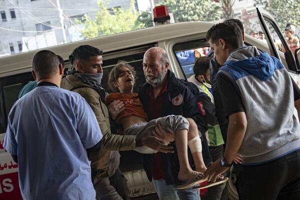 A Palestinian girl wounded in Israeli bombardment of the Gaza Strip is brought to a hospital in Khan Younis. Picture: AP Photo/Fatima Shbair A Palestinian girl wounded in Israeli bombardment of the Gaza Strip is brought to a hospital in Khan Younis. Picture: AP Photo/Fatima Shbair