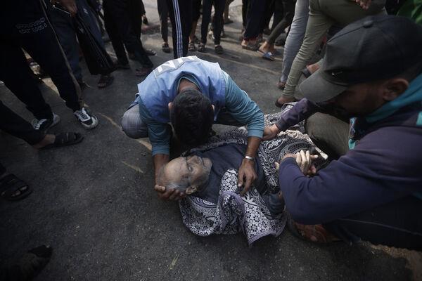 Palestinians evacuate survivors of the Israeli bombing In Khan Younis refugee camp in Gaza Strip on Friday. Picture: AP Photo/Mohammed Dahman Palestinians evacuate survivors of the Israeli bombing In Khan Younis refugee camp in Gaza Strip on Friday. Picture: AP Photo/Mohammed Dahman