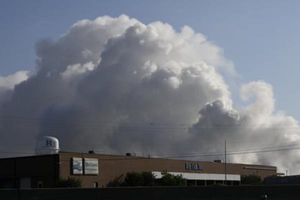 plume of smoke above building