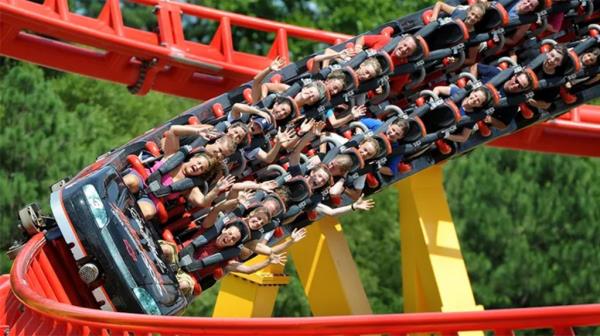 Guests ride the "Intimidator 305" roller coaster at Kings Dominion Amusement Park in Doswell, Virginia, in July 2011.