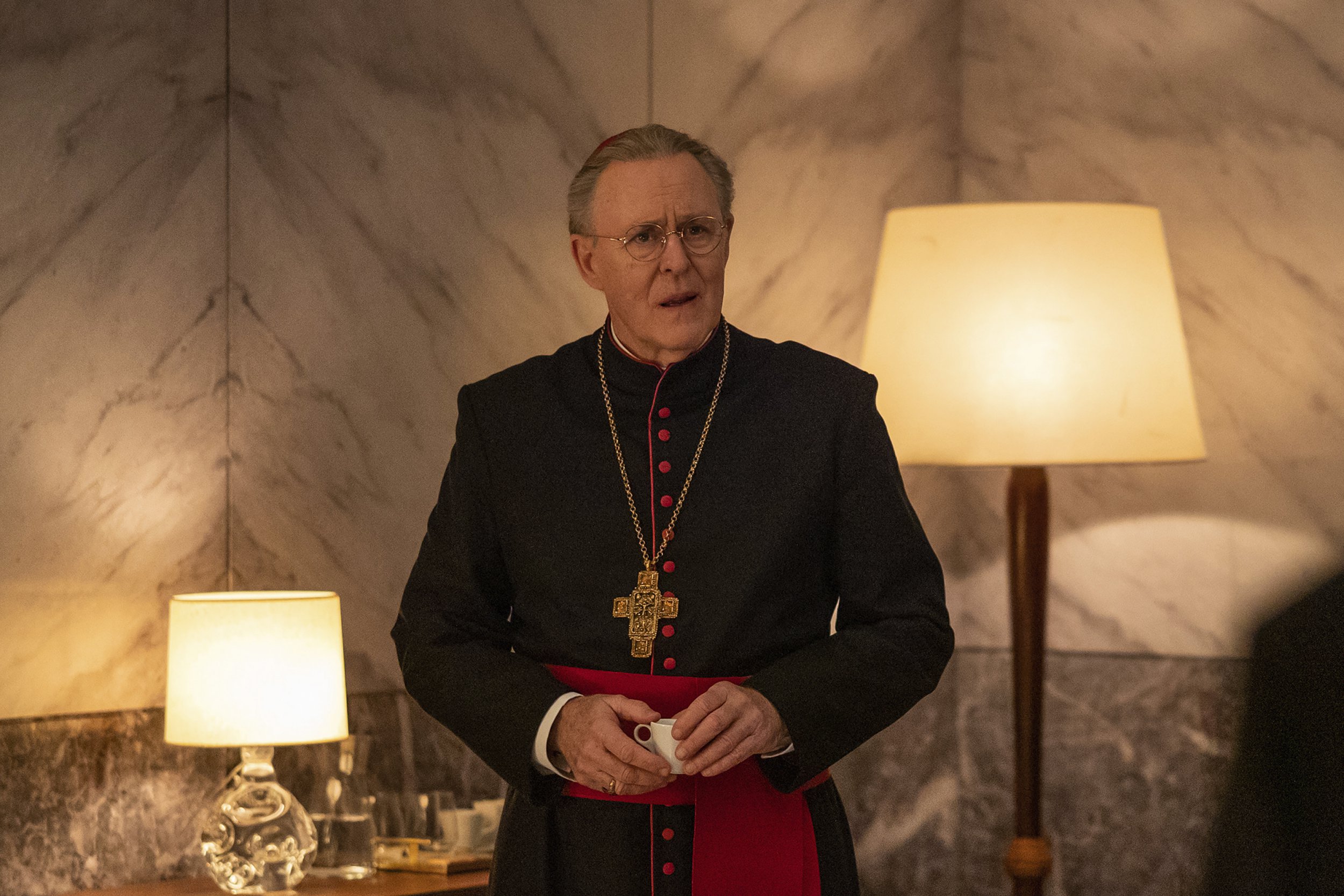 John Lithgow as Cardinal Tremblay in a scene from Conclave.