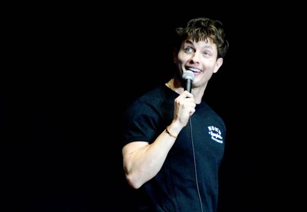 Matt Rife talking into a mic. 