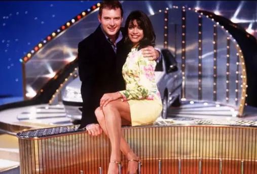 John Leslie and Jenny Powell on Wheel of Fortune.