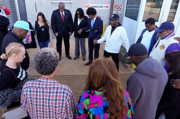 Family and friends of Nichols praying outside of the federal courthouse during jury deliberation on Oct. 2, 2024.
