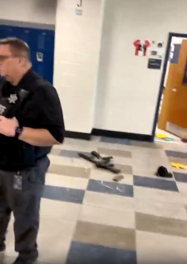 Gun seen on the ground in the school
