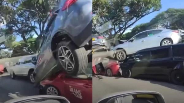 Cars stacked on top of each other after mass pile-up along ECP