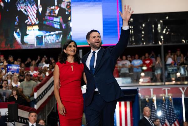 Republican vice presidential nominee U.S. Sen. J.D. Vance (R-OH) and his wife Usha Vance take the stage to introduce U.S. Republican Presidential nominee former President Donald Trump during a rally at Herb Brooks National Hockey Center on July 27, 2024 in St Cloud, Minnesota.