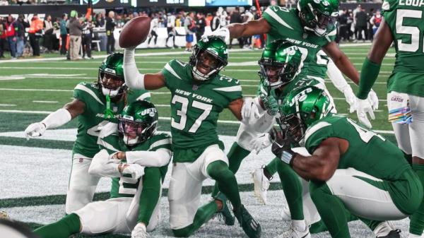 Oct 15, 2023; East Rutherford, New Jersey, USA; New York Jets cornerback Bryce Hall (37) celebrates with teammates after an interception during the second half against the Philadelphia Eagles at MetLife Stadium. Mandatory Credit: Vincent Carchietta-USA TODAY Sports