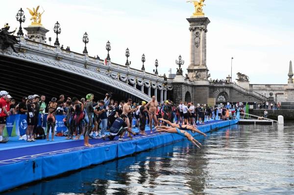 Seine pollution scraps swimming stage of pre-Olympics triathlon