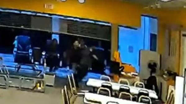 This frame from surveillance footage shows an assault that happened at a carnival at the Exton Square Mall in Exton, PA on Saturday night, police say. (West Whiteland Police Department)