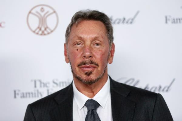 Larry Ellison in a suit attending the Rebels With A Cause Gala 2019 at Lawrence J Ellison Institute for Transformative Medicine of USC.