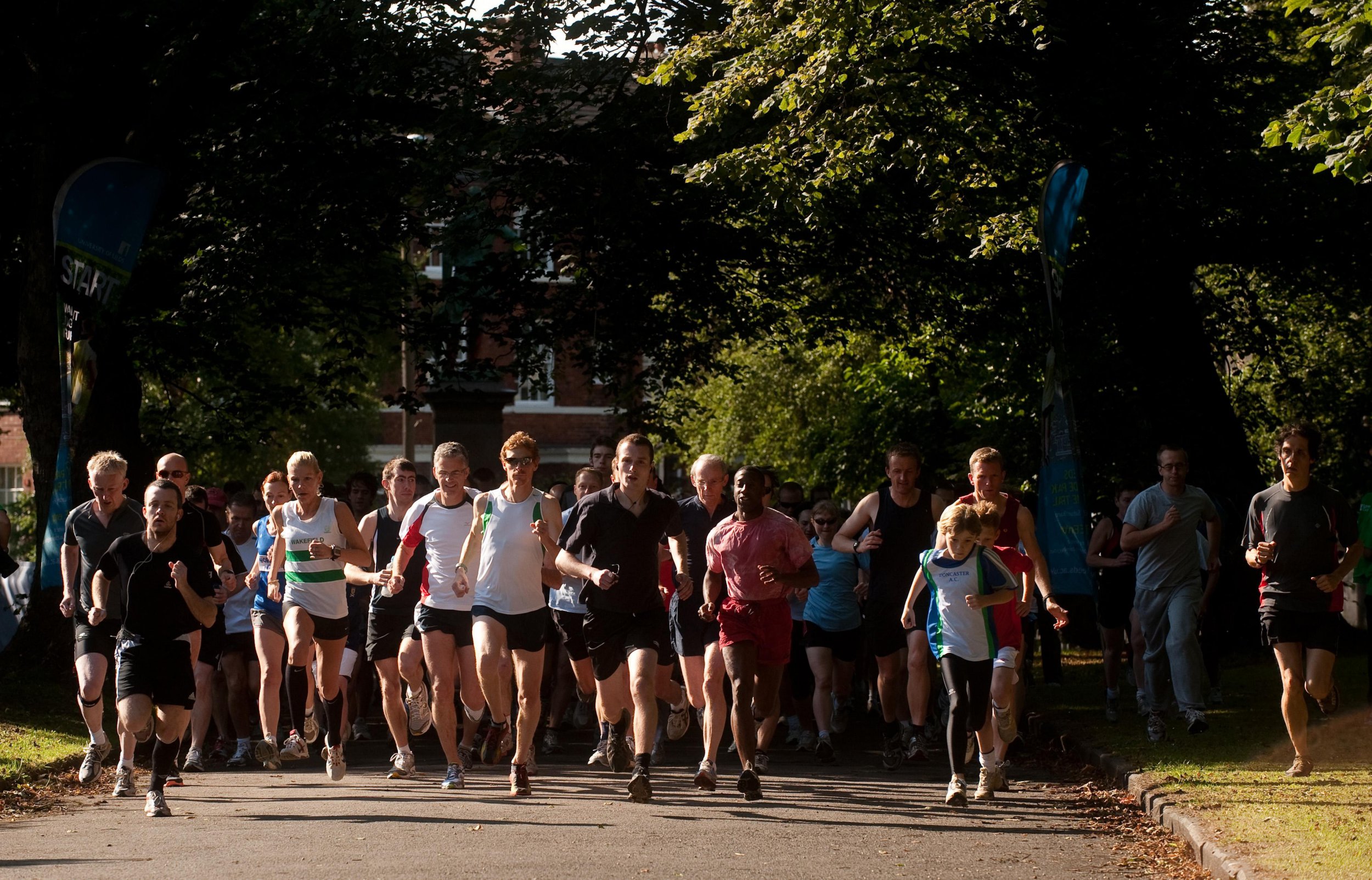 Participants in the 5km parkrun around Hyde Park in Leeds