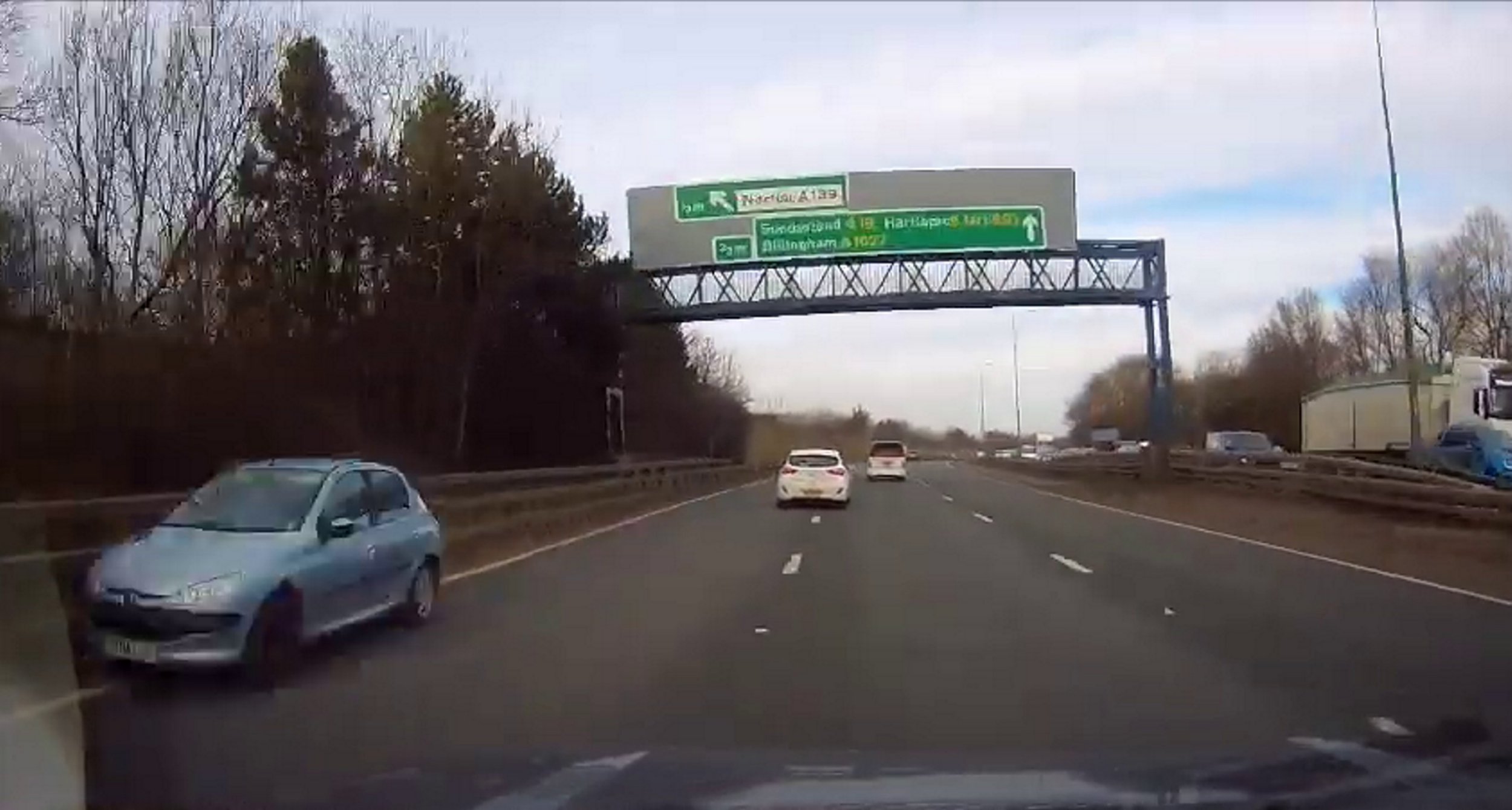 car narrowly misses