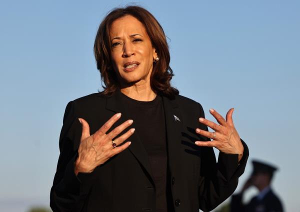 Kamala Harris speaks to the media before boarding Air Force Two after assessing the Hurricane Helene recovery response in North Carolina on October 5, 2024 in Charlotte, North Carolina.