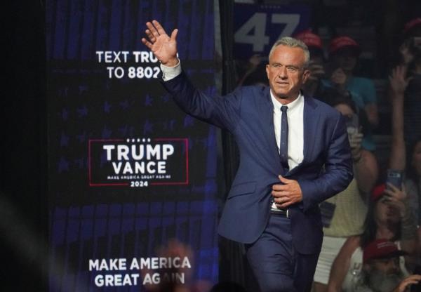 Robert F. Kennedy Jr. gestures during Republican presidential nominee and former U.S. President Donald Trump's rally in Glendale, Arizona, U.S., August 23, 2024.