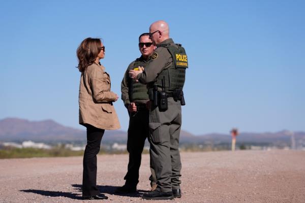 Democratic presidential nominee Vice President Kamala Harris talks with members of the U.S. Border Patrol as she visits the U.S. border with Mexico in Douglas, Ariz., Friday, Sept. 27, 2024.