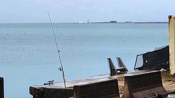 No injuries as US military plane overshoots runway and ends up in sea