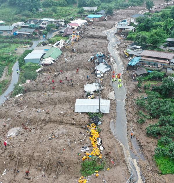 Officials said it was unclear how many people were trapped in the flooded underground roadway.