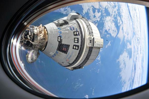 This photo provided by NASA shows Boeing's Starliner spacecraft which launched astronauts Butch Wilmore and Suni Williams to the International Space Station docked to the Harmony module's forward port on July 3, 2024
