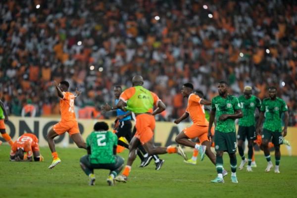 Ivory Coast players celebrate after the African Cup of Nations final soccer match between Ivory Nigeria and Coast, at the Olympic Stadium of Ebimpe in Abidjan, Ivory Coast, Sunday, Feb. 11, 2024. Ivory Coast won the match 2-1. (AP Photo/Themba Hadebe)