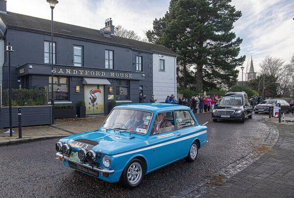 Rosemary Smith’s Funeral as it passes through Sandyford Village. Rosemary Smith’s Funeral as it passes through Sandyford Village.