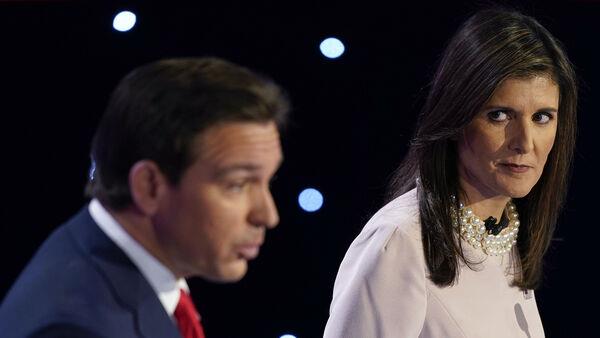 Republican rivals attack each other’s record in debate without Trump