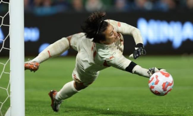 Manchester City’s Ayaka Yamashita saves a shootout penalty against Leicester
