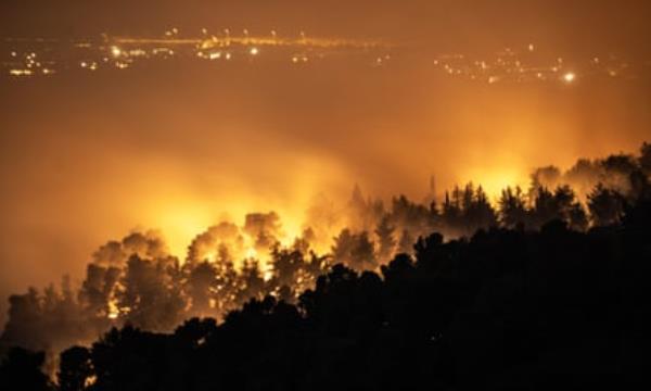 Smoke rises after Israeli airstrike sparks fire in Lebanese forest