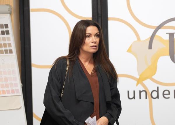 Carla looks shocked in Coronation Street