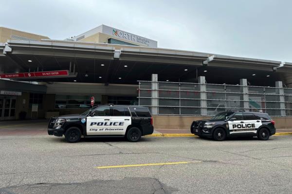 Police cars outside of a hospital in Robbinsdale where three of the wounded officers were taken.