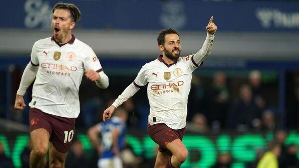 Three second-half goals see champions Manchester City battle back against Everton