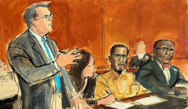 In this courtroom sketch, Sean 'Diddy' Combs' defense attorney Marc Agnifilo, left, addresses the judge while Combs, seated second from right, in a prison uniform, watches during a hearing in federal court in New York, on October 10, 2024. 