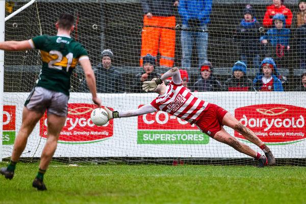 Patrick Doyle of Cork tries to save a penalty of Barry Dan O’Sullivan of Kerry. Pic Credit: Natasha Barton, Inpho. Patrick Doyle of Cork tries to save a penalty of Barry Dan O’Sullivan of Kerry. Pic Credit: Natasha Barton, Inpho.