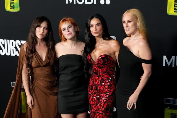 Scout LaRue Willis, Tallulah Willis, Demi Moore, and Rumer Willis attend the Los Angeles Premiere Of "The Substance."