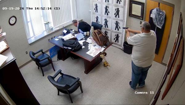 Mullins appeared to turn away and hide as Stines fired off shots.