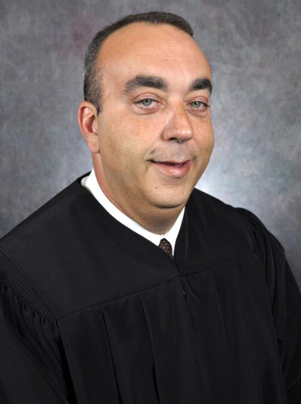 Mullins was killed in the chambers where he served for 15 years.
