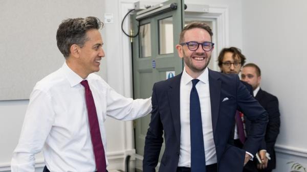 Energy secretary Ed Miliband (left) appointed Chris Stark as head of mission control for clean power by 2030