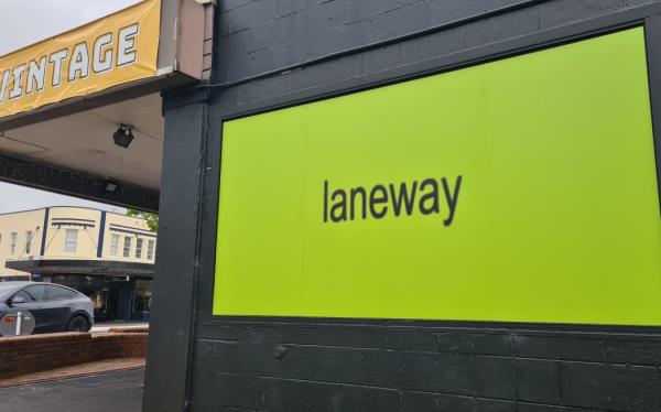 A Laneway Festival promotional billboard is seen in Auckland's Ponsonby on 2 October, 2024.