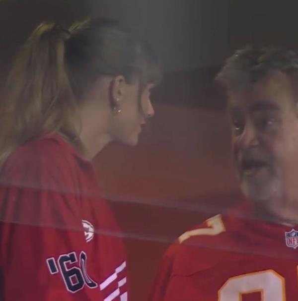Travis Kelce and his father Ed Kelce pose together in tuxedos
