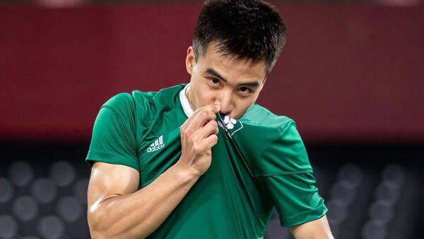 STAR: Nhat Nguyen kisses the Irish badge after a victory. STAR: Nhat Nguyen kisses the Irish badge after a victory.