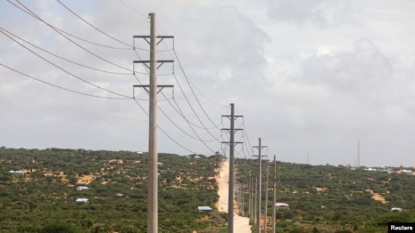 FILE - Electrical power lines from the Benadir Electricity Company (BECO) solar project in the outskirts Mogadishu, May 21, 2020.