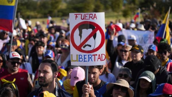 Venezuelan nationals protest against the results of their country's presidential election, in Quito, Ecuador, Aug. 3, 2024. 