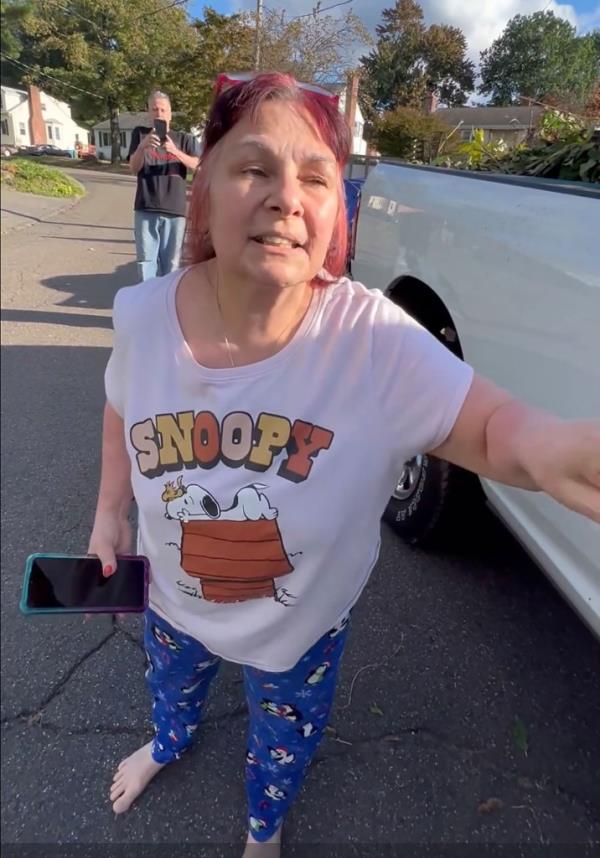 Sharon Bourgeois-Williams yelling at the men.