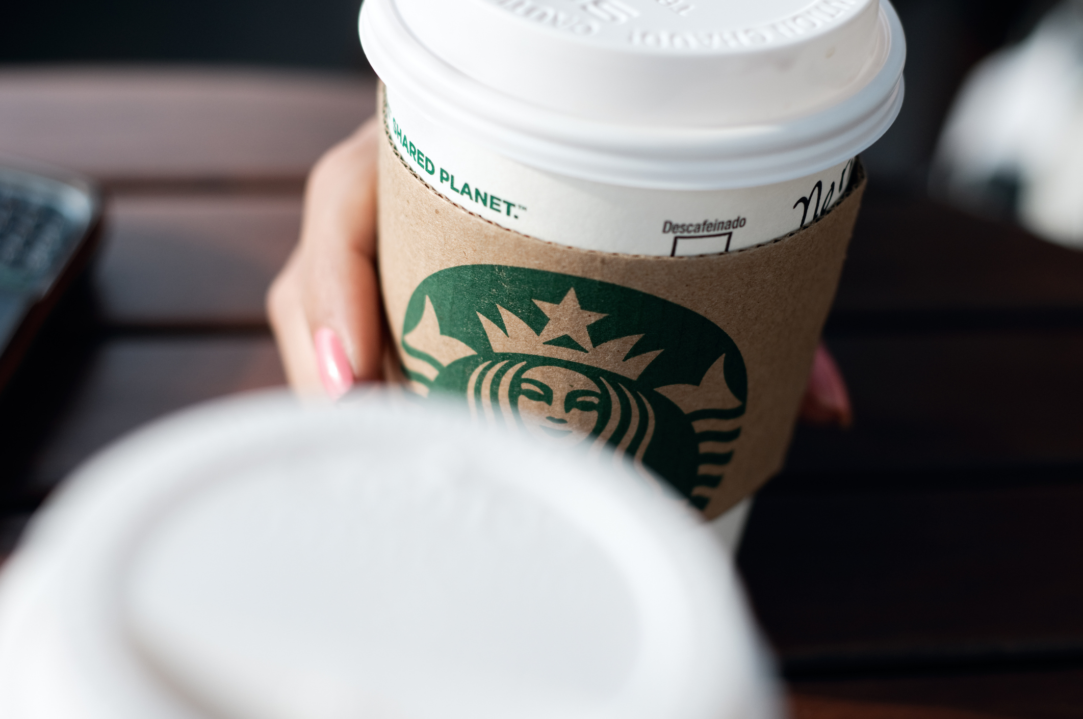 Starbucks takeaway coffee cup.