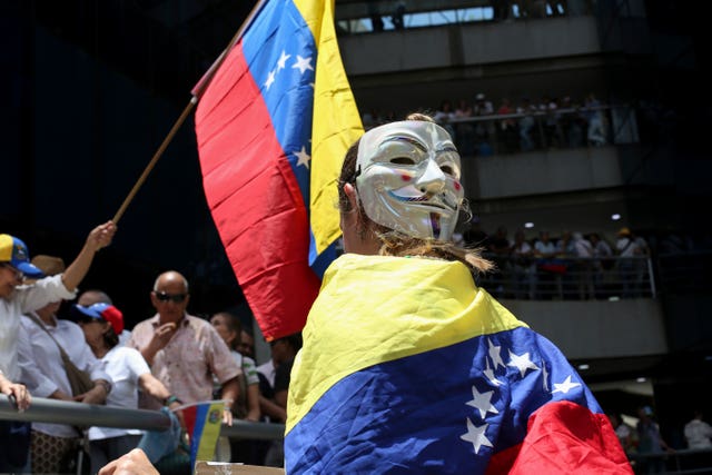 Opposition supporters protest the re-election of President Nicolas Maduro