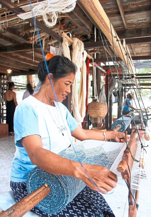 One of the cotton weavers at Tohsang Cotton Village.