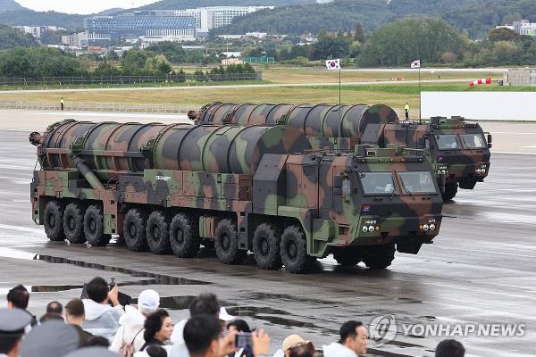 Transporter erector launchers carrying Hyunmoo-5 ballistic missiles move on the tarmac at Seoul Air base in Seongnam, just south of Seoul, for South Korea's Armed Forces Day ceremony on Oct. 1, 2024. (Yonhap)